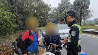 骑电动自行车上高速 两名男子被陵水交警处罚