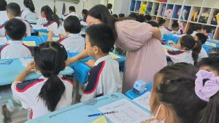 郑州市金水区第二实验小学：在交流中分享，在点评中进步