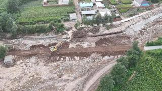 组图：葫芦岛市建昌县多条水毁道路正在抢修中