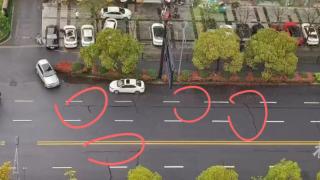 杭州九堡路面因台湾地震出现裂缝？记者核实：只是过往路面修补痕迹