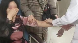 扬州一女子不配合酒精检测，被交警带至医院抽血检验