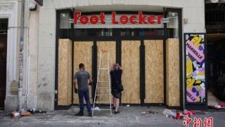 法国骚乱持续：多家店铺遭洗劫破坏 商户装挡板防盗