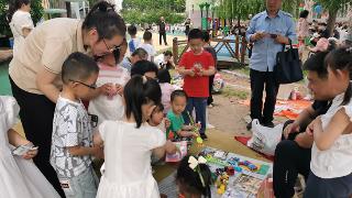 莒南县实验幼儿园举办“庆六一”跳蚤市场活动